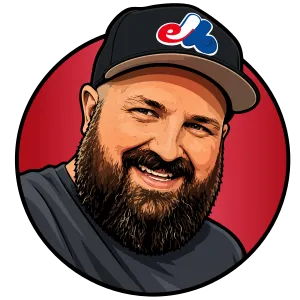 An illustrated portrait of a slightly burly guy with an affable nature and a dark brown beard. He's wearing a black Montreal Expos cap and a gray t-shirt.